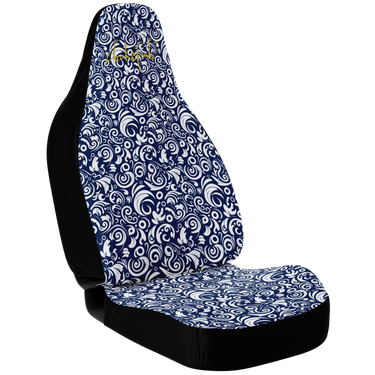A custom car seat cover featuring a blue and white geometric pattern.